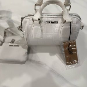 Steve Madden vintage bag with a mini airpod case